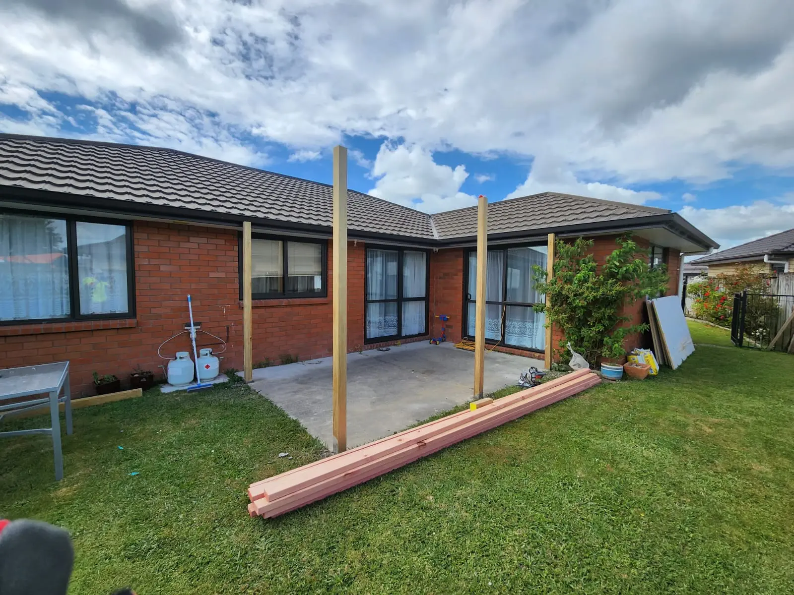 Outdoor patio with wooden decking and stylish seating area